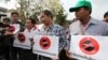 In this photo taken on April 4, 2016, Cambodian union leader and activists speak to the press during a rally against the union law, outside the National Assembly in Phnom Penh, Cambodia. (Leng Len/VOA Khmer)