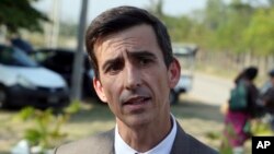French consular official Frederic Inza speaks to journalists outside a court in Naypyitaw, Myanmar, Feb. 27, 2019.