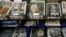 Newspapers with pictures of Nelson Mandela on the front page on sale in London, Dec. 6, 2013. 