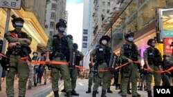 香港警方10月1日在銅鑼灣一帶部署上千警力，拉起封鎖線，未有讓傳媒進入封鎖區採訪。