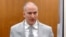 FILE - Former Minneapolis police Officer Derek Chauvin addresses the court as Hennepin County Judge Peter Cahill presides over Chauvin's sentencing at the Hennepin County Courthouse in Minneapolis June 25, 2021.