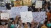 Members of civil society groups take part in a rally to condemn the incident of rape on a deserted highway, in Karachi, Pakistan, Sept. 12, 2020.
