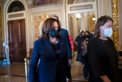 Vice President Kamala Harris arrives to break the tie on a procedural vote as the Senate works on the Democrats' $1.9 trillion COVID relief package, on Capitol Hill in Washington, March 4, 2021.