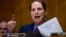 FILE - Sen. Ron Wyden, D-Oregon, speaks on Capitol Hill in Washington, Sept. 25, 2017. Wyden wants to know how well prepared the country’s top voting machine manufacturers are against hackers. 