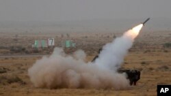 FILE - A surface-to-air missile is launched during exercise 'Iron Fist' at Pokhran, India, March 18, 2016. 