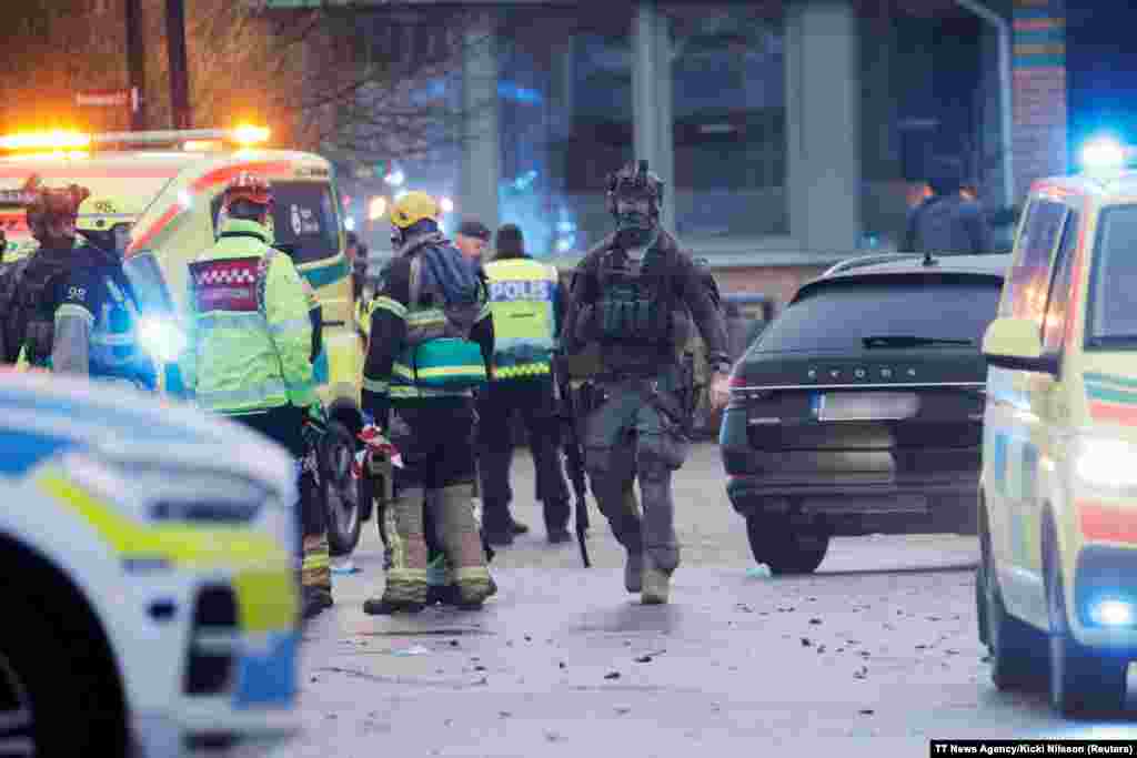 Emergency personnel and police officers work at the adult education center Campus Risbergska school after a shooting attack in Orebro, Sweden.&nbsp; At least 10 people have been killed in the shooting, Swedish police said. &nbsp;