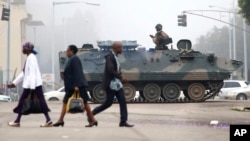 An armed soldier patrols a street in Harare, Zimbabwe, Nov. 15, 2017. 