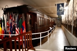 FILE - A view shows the replica of the wagon where the Germans signed the armistice in 1918 that ended the World War I at the Armistice Museum in the Clairiere de Rethondes in Compiegne, France, Aug. 30, 2018.