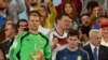 Germany's goalkeeper Manuel Neuer winner of the golden glove award for best goalkeeper stands alongside golden ball winner Argentina's Lionel Messi after the World Cup final soccer match between Germany and Argentina in Rio de Janeiro, Brazil, July 13, 20