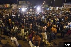 Opposition supporters keep an all-night vigil to press for constitutional reform, during anti-government protests led by a coalition of opposition parties in Lome, Togo, Sept. 7, 2017.