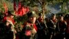 FILE - Officers with the Ta’ang National Liberation Army gather in the steep hillside jungles in Mar Wong, a village in northern Shan state, Myanmar. 