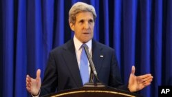 U.S. Secretary of State John Kerry speaks during a press conference at Queen Alia International Airport in Amman, Jordan, July 19, 2013. 