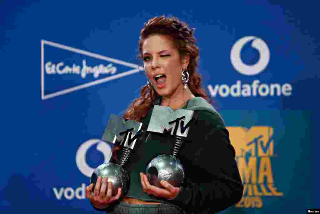 Halsey poses with the Best Pop and Best Look awards at the backstage during the 2019 MTV Europe Music Awards at the FIBES Conference and Exhibition Centre in Seville, Spain, Nov. 3, 2019.