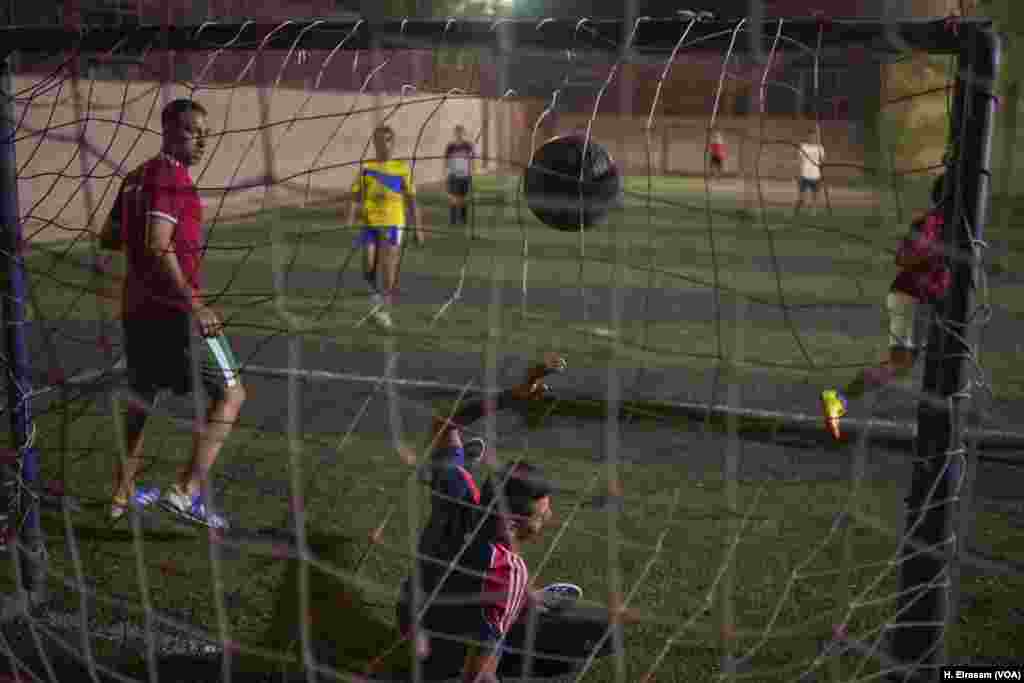 A player scores a goal in a match between two Coptic teams at a monastery in Manshyat Nasser Eastern Cairo.