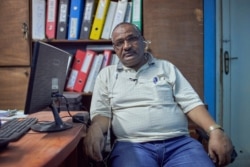 Taher Omar, an Ethiopian refugee and community leaders says complaints about racist incidents come in daily to his office in Cairo on July 27, 2020. (VOA/Hamada Elrasam)