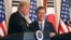 FILE - President Donald Trump, left, speaks as South Korean President Moon Jae-in looks on during a joint news conference at the Blue House in Seoul, South Korea, Nov. 7, 2017.