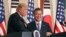 FILE - President Donald Trump, left, speaks as South Korean President Moon Jae-in looks on during a joint news conference at the Blue House in Seoul, South Korea, Nov. 7, 2017.