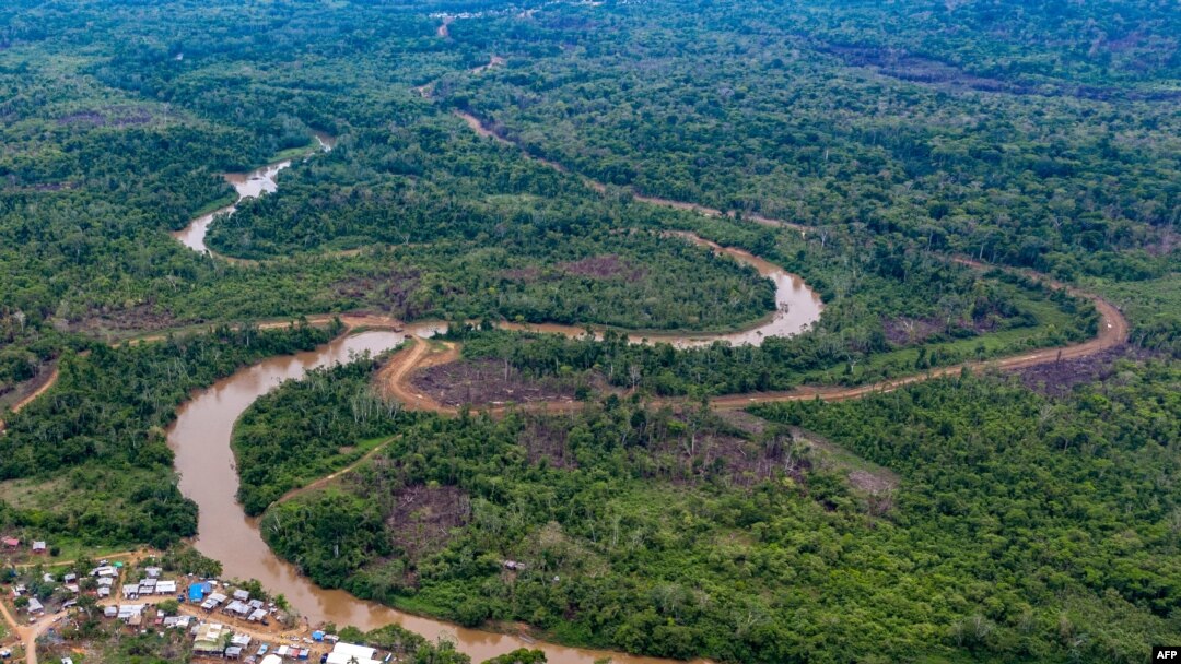 FILE - Aerial view of La Penita indigenous village, Darien province, Panama, May 23, 2019. Migrants cross the border between Colombia and Panama through the Darien Gap on their way to the United States.