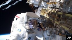 During the STS-131 mission's first spacewalk, which lasted about 6.5 hours, NASA astronaut Rick Mastracchio helped move a new 1,700-pound ammonia tank from space shuttle Discovery's cargo bay