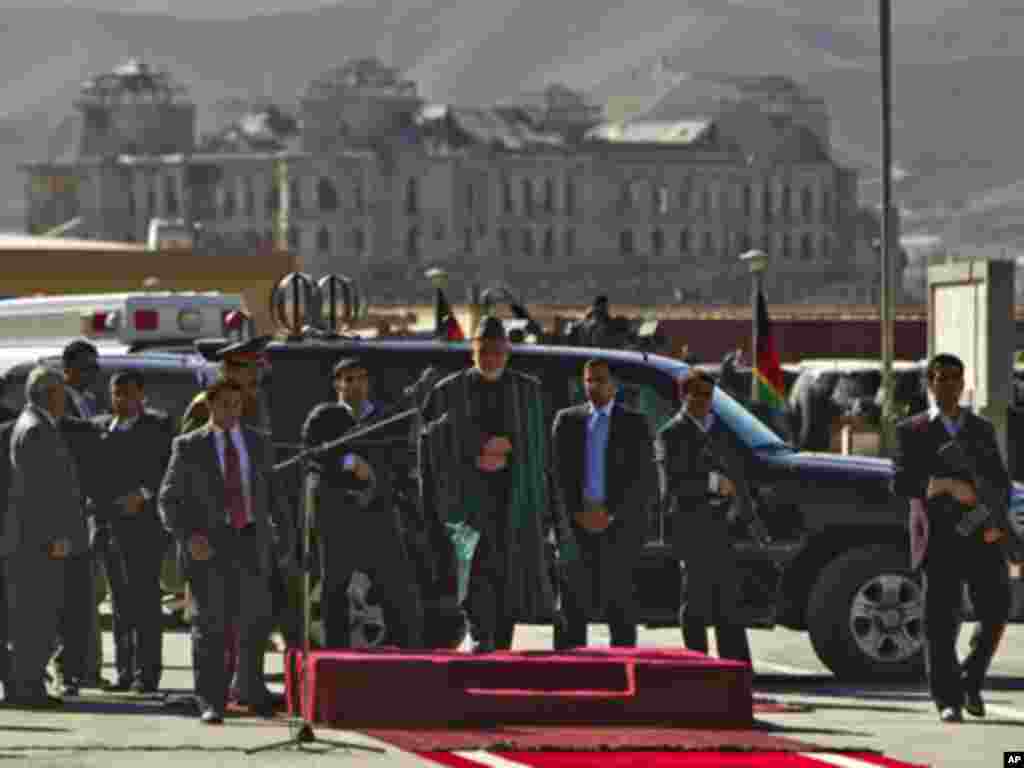 Afghan President Hamid Karzai arrives to inaugurate Afghanistan's parliament in Kabul January 26, 2011. Afghan President Hamid Karzai opened parliament on Wednesday, ending a standoff with lawmakers, but setting the stage for a longer battle against an as