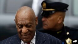 FILE - Comedian Bill Cosby arrives for a pretrial hearing in his sexual assault case, March 29, 2018, at the Montgomery County Courthouse in Norristown, Pennsylvania.