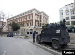 An armored police vehicle waits in front of the German Consulate, which is closed on indications of a possible imminent attack, in Istanbul, Turkey March 17, 2016.