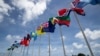 FILE - National flags for the Pacific Islands Forum are on display on the tiny Pacific nation of Nauru, Sept. 3, 2018. 