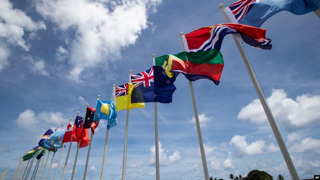 FILE - National flags for the Pacific Islands Forum are on display on the tiny Pacific nation of Nauru, Sept. 3, 2018. 