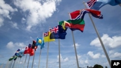 FILE - National flags for the Pacific Islands Forum are on display on the tiny Pacific nation of Nauru, Sept. 3, 2018. 