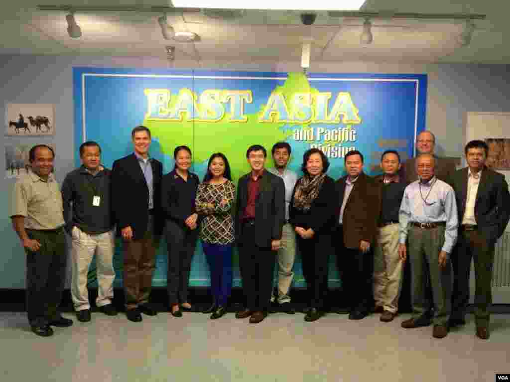 VOA Khmer team in Washington: (left to right) Reasey Poch, Pochin Choeng, Guest, Moryvan Ly, Manilene Ek, Kimseng Men, Sophat Soeung, Sarita Nuch, Khemara Sok, Sisovann Pin, Yann Ker, Chris Decherd (behind), and Sothearith Im.