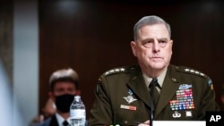 Chairman of the Joint Chiefs of Staff Gen. Mark Milley attends a Senate Armed Services Committee hearing on the conclusion of military operations in Afghanistan and plans for future counterterrorism operations, on Capitol Hill, Sept. 28, 2021.