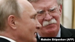 RUSSIA -- Russian President Vladimir Putin attends a meeting with U.S. National Security Adviser John Bolton at the Kremlin in Moscow, October 23, 2018