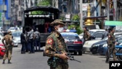 ရန်ကုန်မြို့အတွင်းတေနရာတွင်တွေ့ရသည့် စစ်သားများ။ (Photo by STR / AFP)