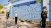 Ursula von der Leyen, president of the European Commission, stands in front of the memorial for Ukrainian soldiers killed in the war against Russia's invasion, in Kyiv on Sept. 20, 2024. Von der Leyen also announced a loan of $39 billion to help rebuild Ukraine's energy grid.