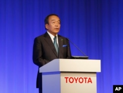 Toyota Motor Corp. Chairman Takeshi Uchiyamada speaks during the 2015 Toyota Environmental Forum in Tokyo, Oct. 14, 2015.