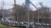 Steel sits on coil cars at the main factory of steel producer thyssenkrupp in Duisburg, Germany, on Feb. 4, 2025. European Union leaders said on Feb. 11 that they would safeguard their interests in the face of new U.S. tariffs on steel and aluminum.