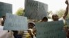 FILE: Zimbabwean doctors and nurses demonstrate in Harare on November 18, 2008. AFP PHOTO / DESMOND KWANDE / AFP PHOTO / DESMOND KWANDE