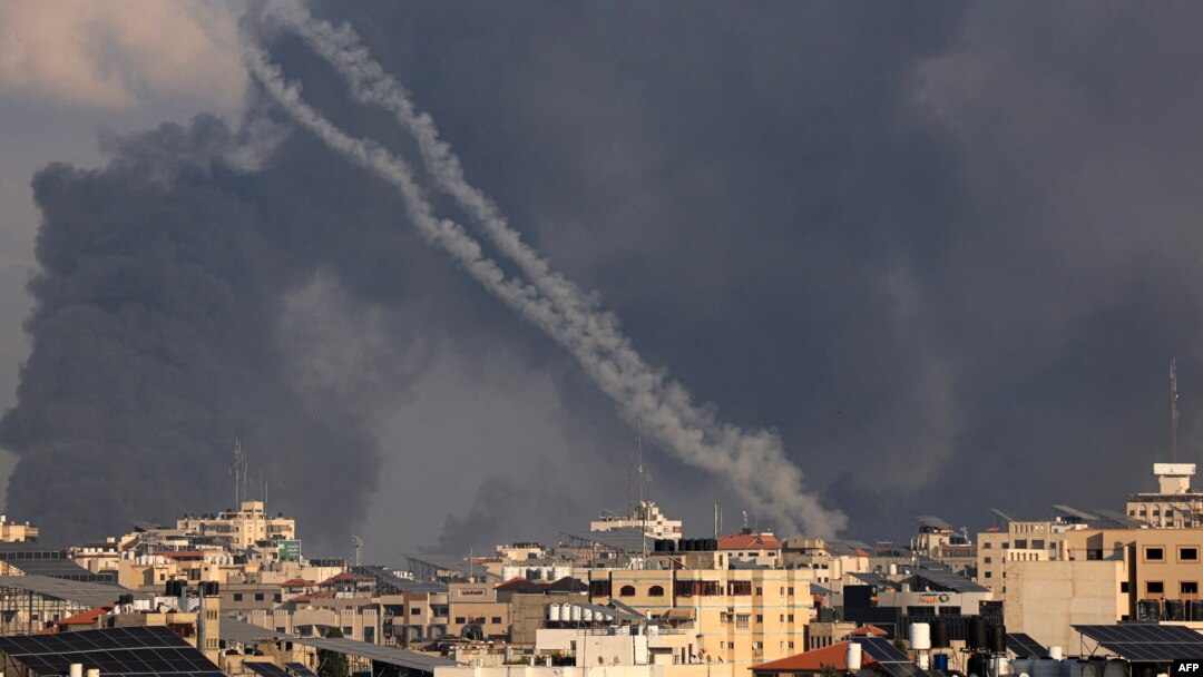 A salvo of rockets is fired by Palestinian militants from Gaza towards Israel on October 10, 2023.
