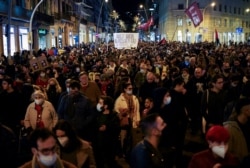 Demonstrators protest demanding measures to control the price of electricity in Barcelona, Spain, Nov. 6, 2021.