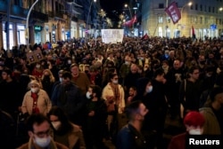 Demonstrators protest demanding measures to control the price of electricity in Barcelona, Spain, Nov. 6, 2021.