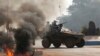 FILE - French troops secure an area along a street in Bangui, Central African Republic, Jan. 19, 2014.