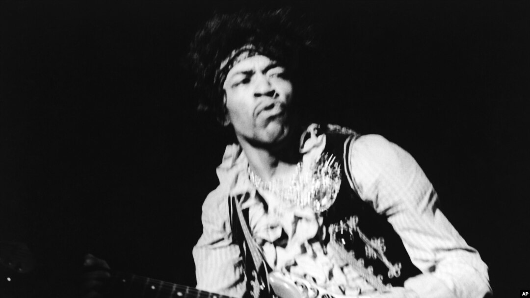 FILE - American rock guitarist Jimi Hendrix performing with The Jimi Hendrix Experience at the Monterey Pop Festival, California, USA, June 18, 1967.