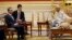 Myanmar's President Htin Kyaw, right, speaks with Chinese Foreign Minister Wang Yi, left, during their meeting at the President House in Naypyitaw, Nov. 19, 2017. (AP Photo/Aung Shine Oo)