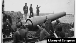 View of a gun pointed at Fort Sumter (Photograph by Samuel A. Cooley/Library of Congress)