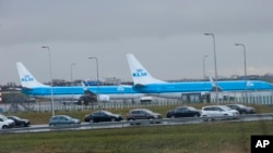 FILE - KLM airplanes sit in Schiphol Airport near Amsterdam, Netherlands, on Jan. 18, 2018. 