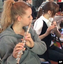 The student orchestra started one year ago with 12 aspiring musicians.