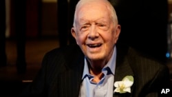 FILE - Former President Jimmy Carter is shown during a reception in Plains, Georgia, July 10, 2021.