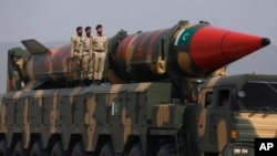 FILE - A Pakistani-made Shaheen-III missile that is capable of carrying nuclear warheads is displayed during a military parade to mark Pakistan National Day, in Islamabad, on March 23, 2022. 