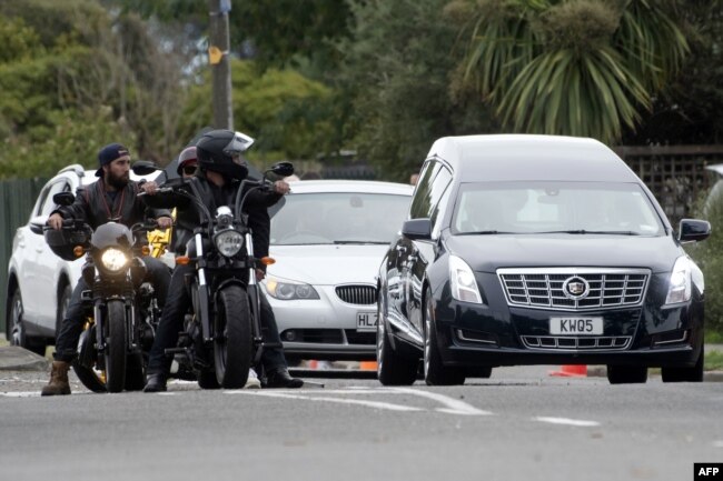 A motorcycle gang provides escort to a hearse transporting the remains of Haji Mohammed Daoud Nabi, killed in New Zealand's twin mosque attacks, to the Memorial Park Cemetery in Christchurch, New Zealand, March 21, 2019.