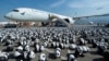 Part of 2,500 panda sculptures are displayed at the Hong Kong International Airport during a welcome ceremony of the panda-themed exhibition 'Panda Go!' in Hong Kong, Dec. 2, 2024.